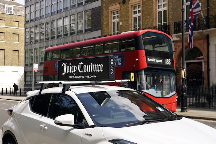 Car screen ad in London.