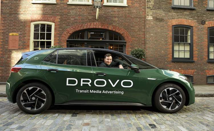 Drovo founder in a Drovo transit media vehicle